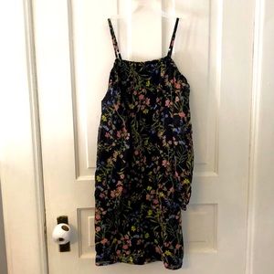 Big girls romper with spaghetti straps And sheer off the shoulder sleeves.